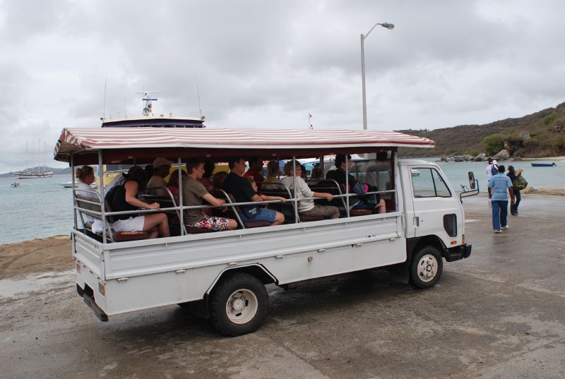 One of many open air buses that shuttles visitors to The Baths.